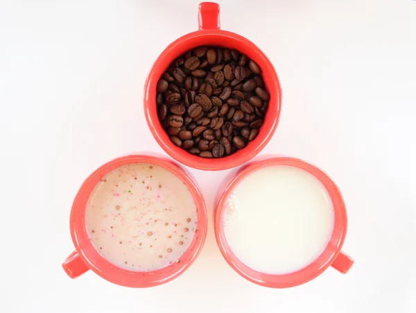 Three cups with coffee sugar and milk — Stock Photo, Image