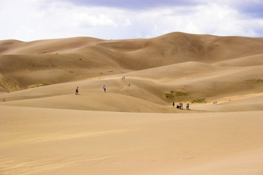 walking in sand dunes clipart