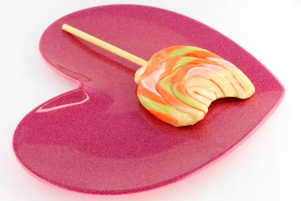 Lollipop on a plate — Stock Photo, Image