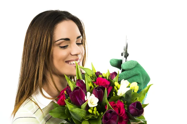 Mulher trabalhadora com flores . — Fotografia de Stock