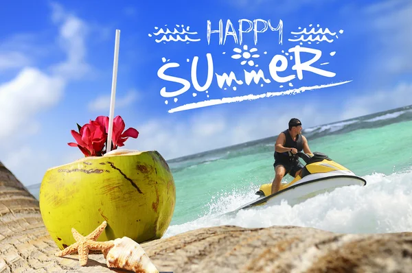 Coconuts and jetski on the beach — Stock Photo, Image