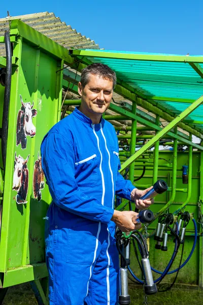 Agriculteur et son équipement de travail — Stockfoto