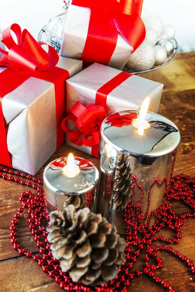 Gift boses and candles for christmas — Stock Photo, Image