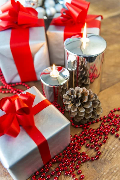 Gift boses and candles for christmas — Stock Photo, Image