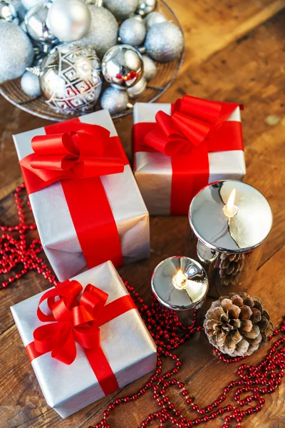 Gift boses and candles for christmas — Stock Photo, Image