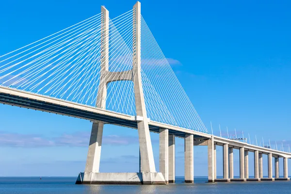 Modern bridge fragment: white against bright blue — Stock Photo, Image