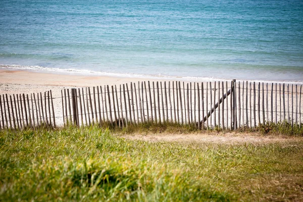 Wooden fence at Northern beach in France — Stock Photo, Image