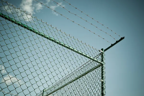 Razor and barbed wire fence — Stock Photo, Image