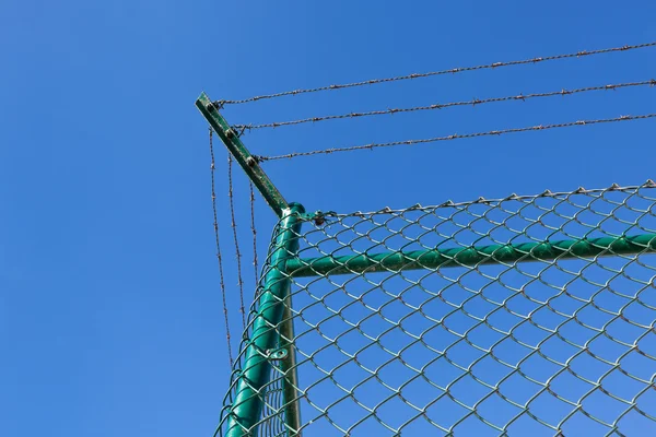 Razor och taggtråd staket — Stockfoto