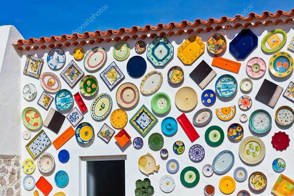 Traditional portuguese pottery plates on a wall