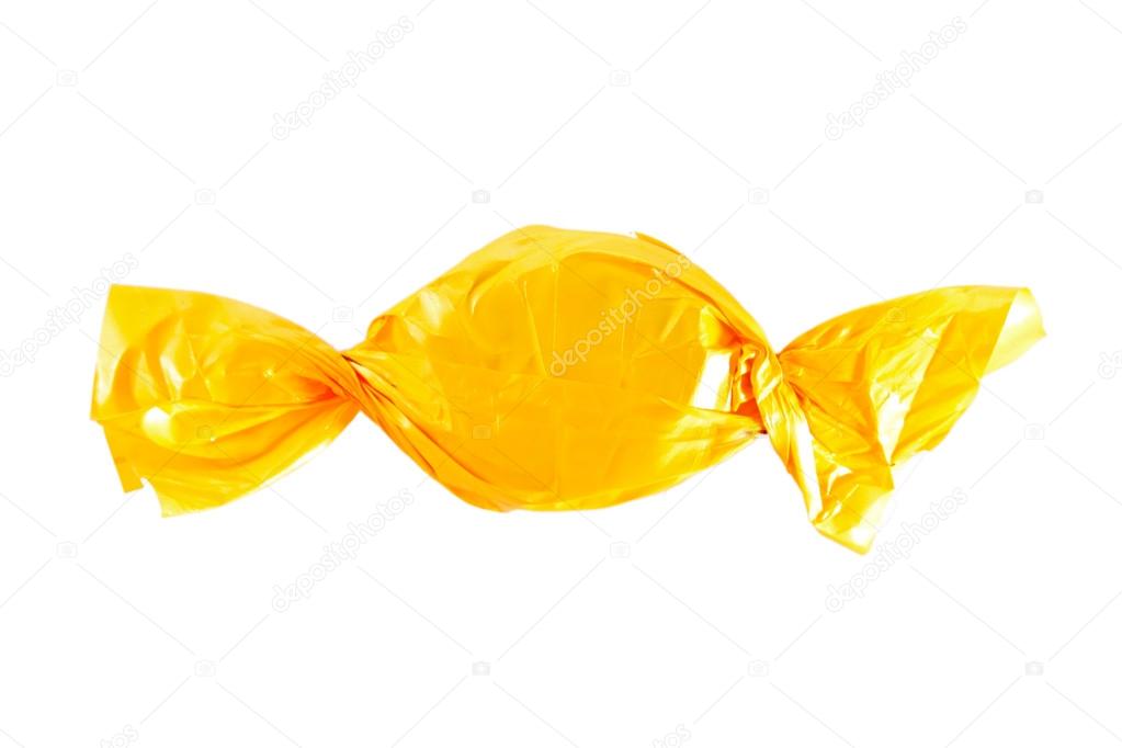 Candy in colored wrapper isolated on white