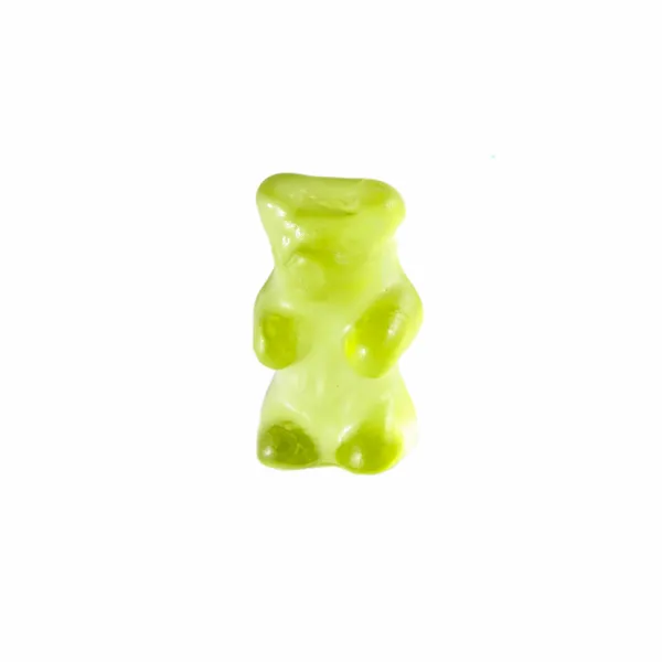 Green gummy bear isolated on white — Stock Photo, Image