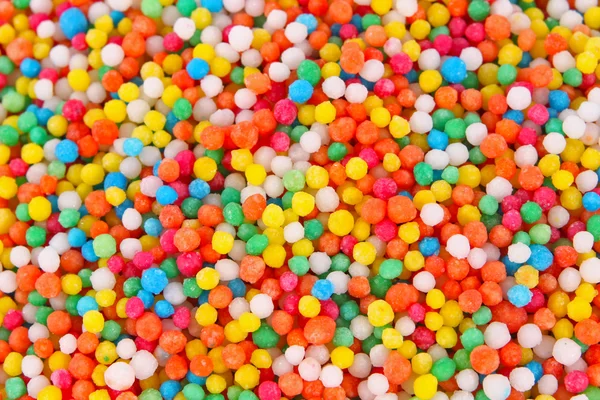 Bonbons colorés doux propagation fond de décoration pâtissière — Photo