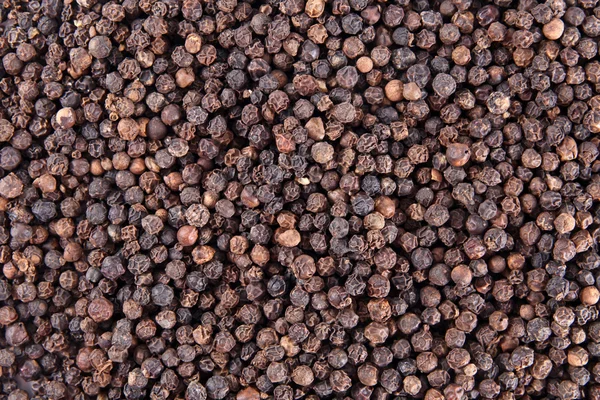 Black pepper background — Stock Photo, Image