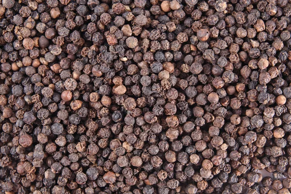 Black pepper background — Stock Photo, Image