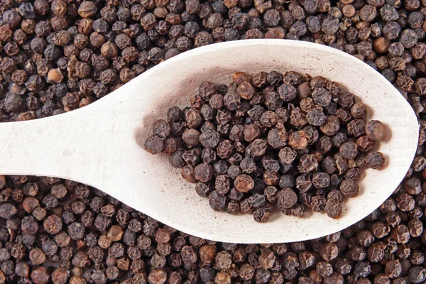 Black pepper background — Stock Photo, Image