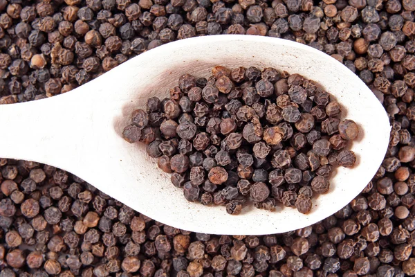 Black pepper background — Stock Photo, Image