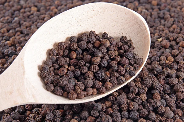 Black pepper background — Stock Photo, Image