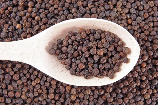 Black pepper background — Stock Photo, Image