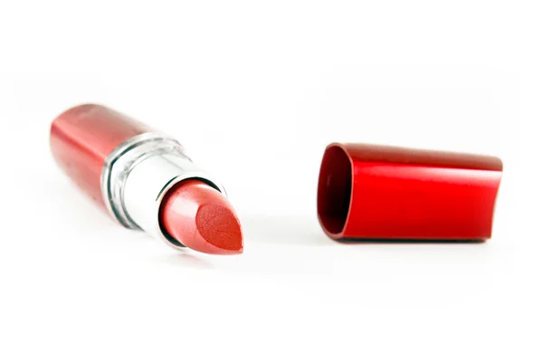 Rouge à lèvres rouge vif isolé sur blanc — Photo