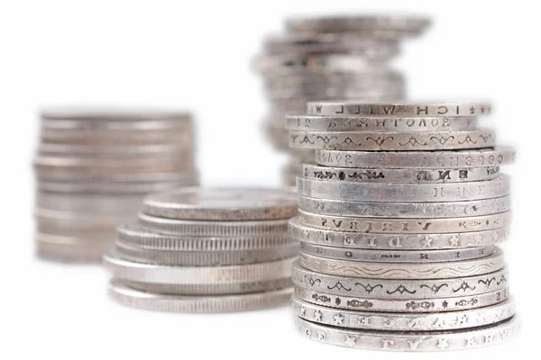 Stacks of silver money coins isolated over the white backgroun — Stock Photo, Image