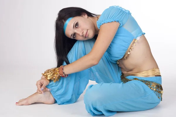 Belly girl in eastern dancing blue clothes — Stock Photo, Image