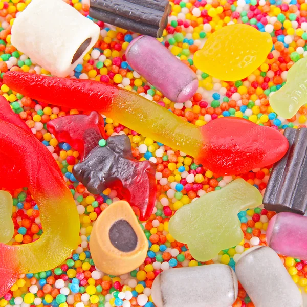 Un sacco di caramelle per sfondo — Foto Stock