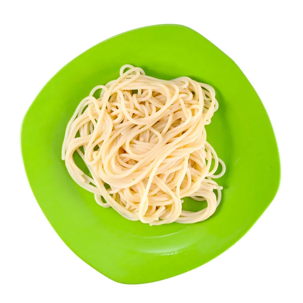 Pasta on the green plate on white — Stock Photo, Image
