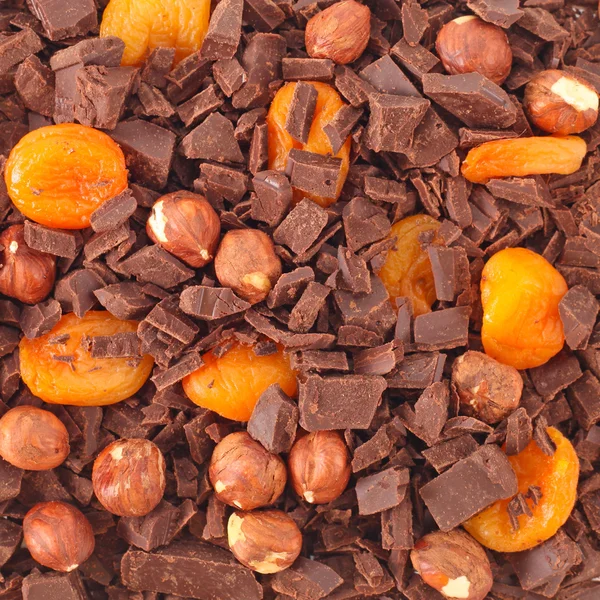 Çikolata fındık ve kayısı arka plan — Stok fotoğraf