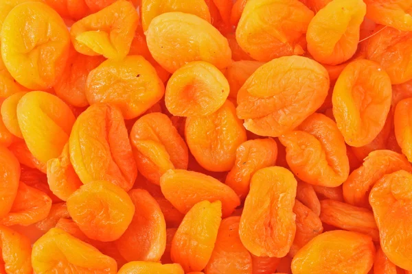 Dry apricots arranged at the background — Stock Photo, Image