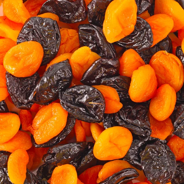 Mixed dried fruits background — Stock Photo, Image