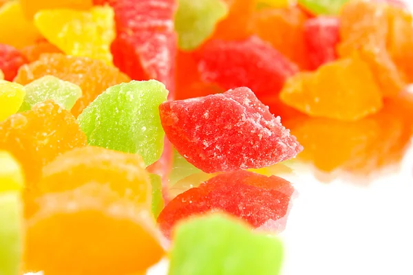 Fruit candy multi-colored on the reflective surface — Stock Photo, Image