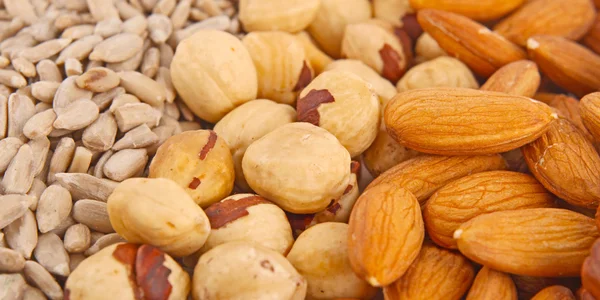 Different nuts as a background — Stock Photo, Image