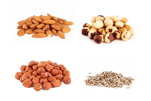 Different nuts on the white background — Stock Photo, Image