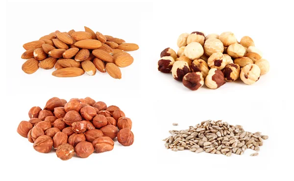 Different nuts on the white background — Stock Photo, Image