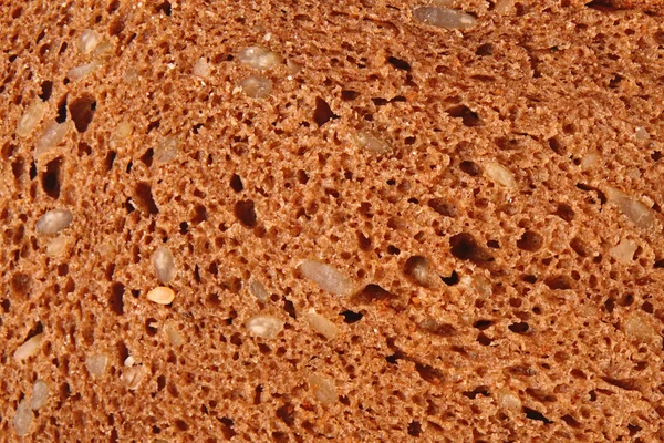 Zwart geheel-korrel brood — Stockfoto