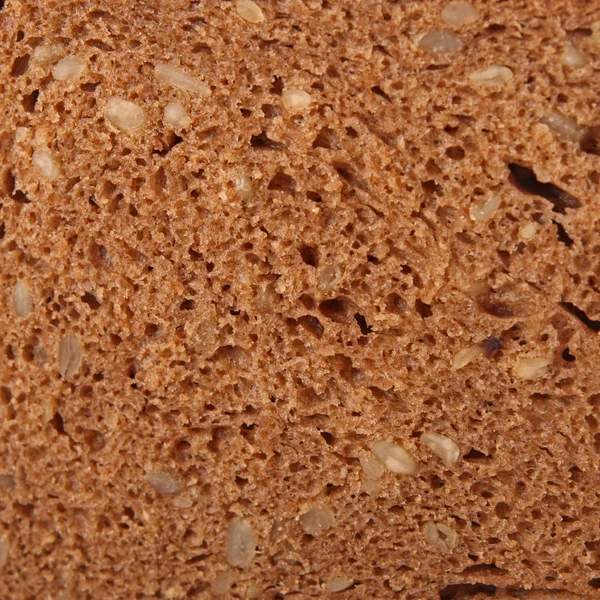 Zwart geheel-korrel brood — Stockfoto