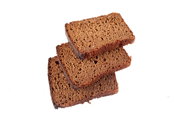 Schwarzes Vollkornbrot isoliert auf weißem Hintergrund — Stockfoto