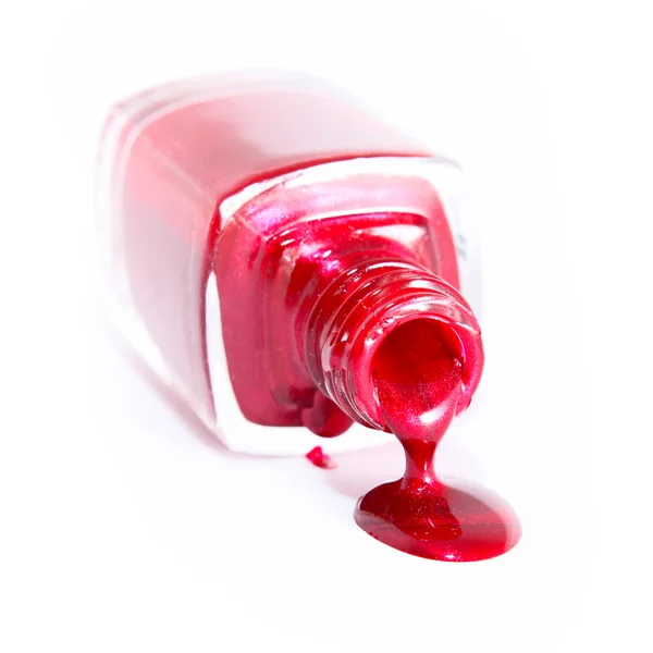 Red nail polish bottle — Stock Photo, Image