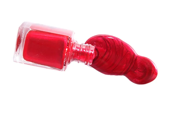Красная бутылка для лака — стоковое фото