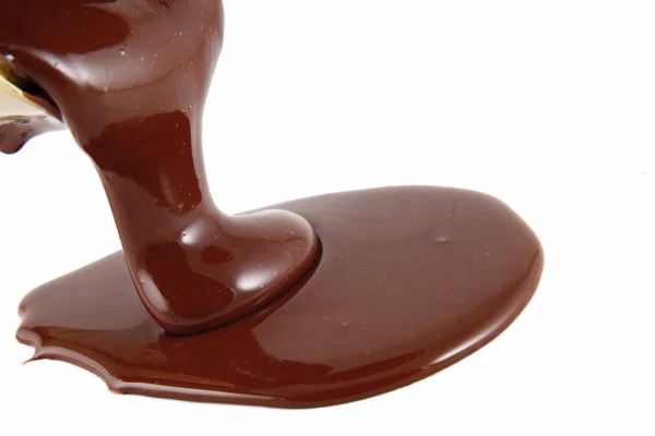 Chocolate flow isolated on white — Stock Photo, Image