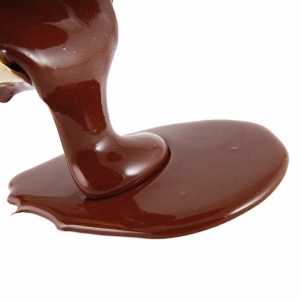 Flujo de chocolate aislado en blanco —  Fotos de Stock
