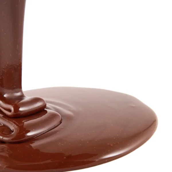 Fluxo de chocolate isolado em branco — Fotografia de Stock