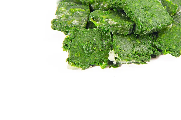 Blocks of frozen spinach — Stock Photo, Image