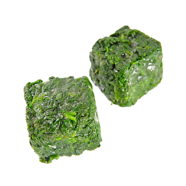 Blocks of frozen spinach — Stock Photo, Image