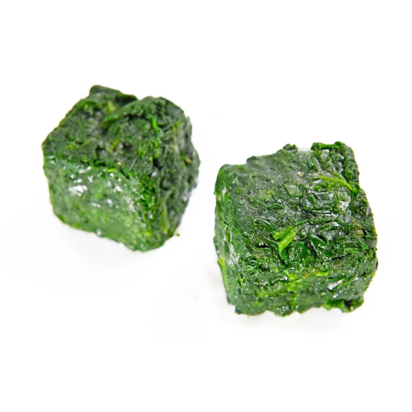 Blocks of frozen spinach — Stock Photo, Image