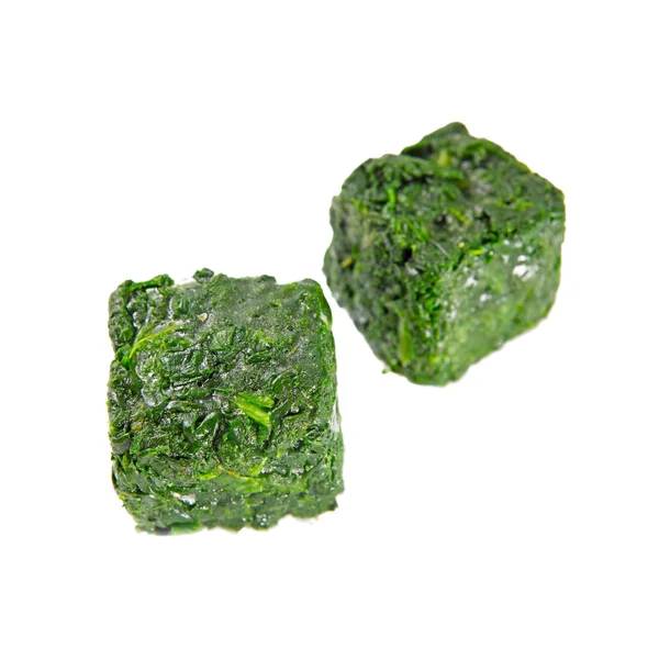 Blocks of frozen spinach — Stock Photo, Image