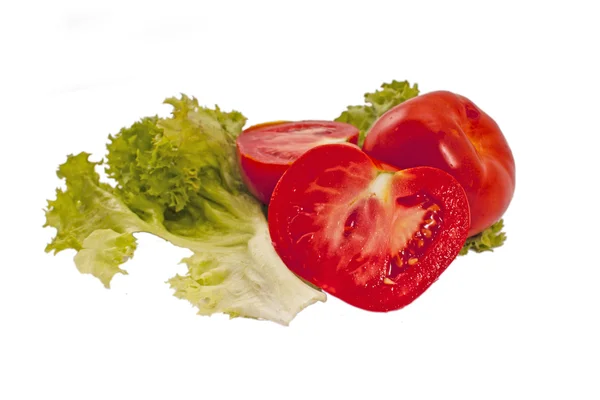 Sabrosos tomates rojos y lechuga — Foto de Stock