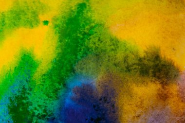 Yeşil, mavi ve sarı renkli soyut suluboya resim