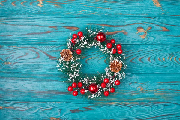 Christmas Wreath Turquoise Wooden Background — Stockfoto